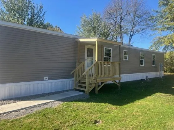 a view of a back yard of the house