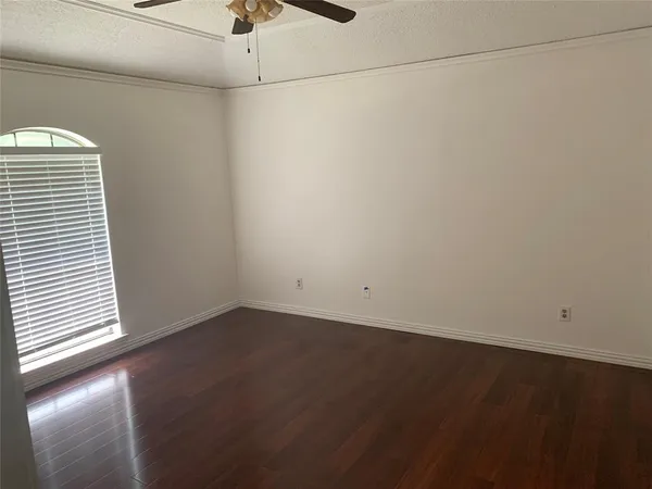 a view of a room that has a window in it