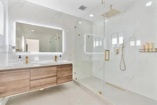 a room with furniture and a wooden floor