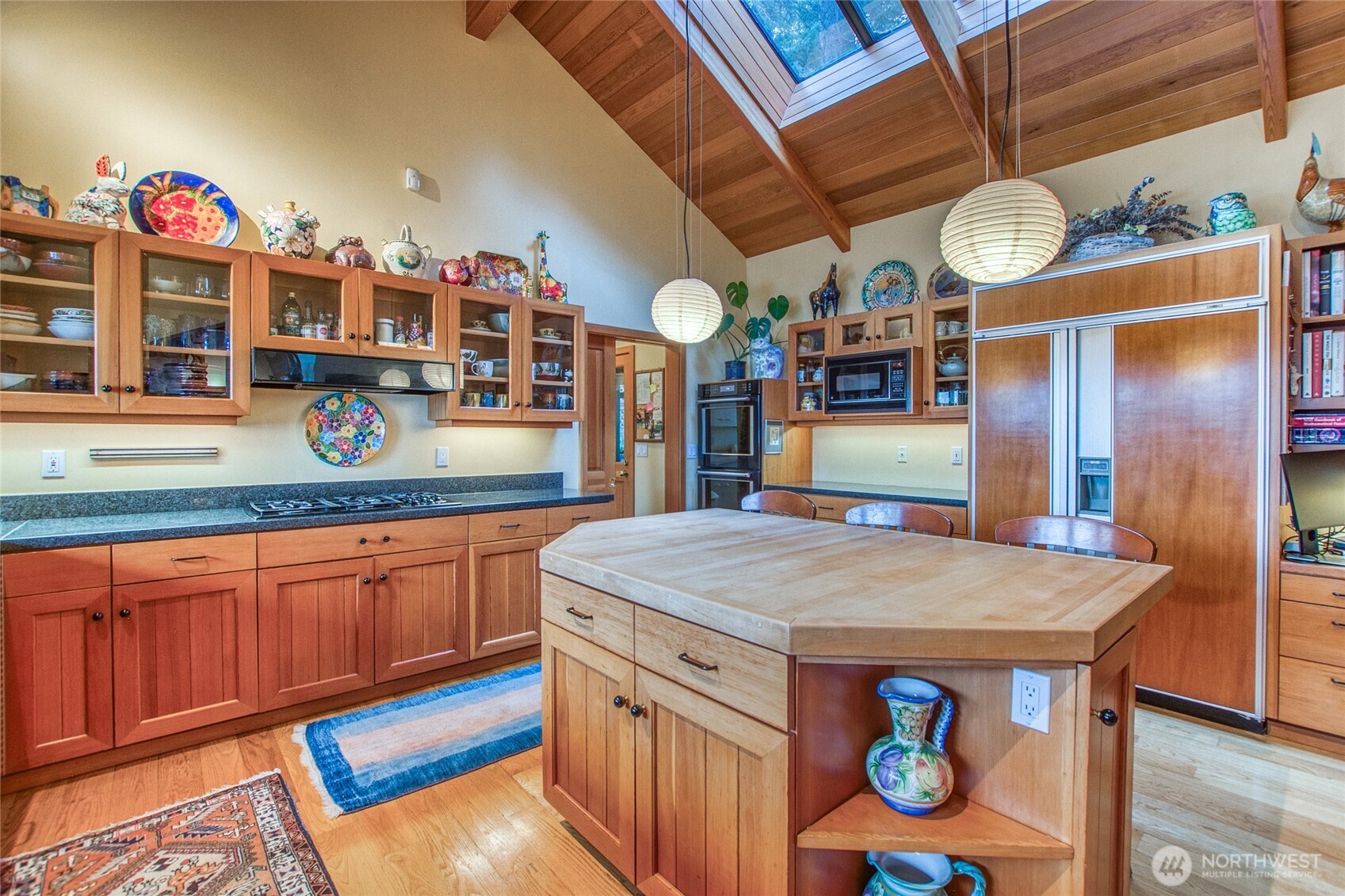 1689 Spring Point Road Orcas Island, WA 98245 - Photo 11 of 40 a kitchen with stainless steel appliances granite countertop a sink and cabinets