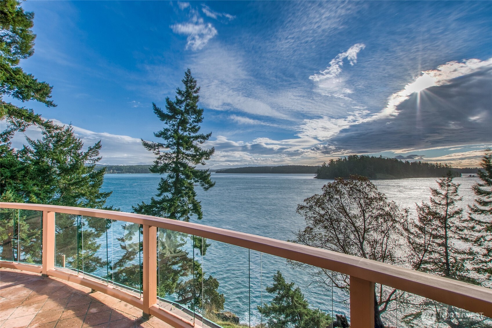 1689 Spring Point Road Orcas Island, WA 98245 - Photo 2 of 40 a view of a balcony with wooden floor