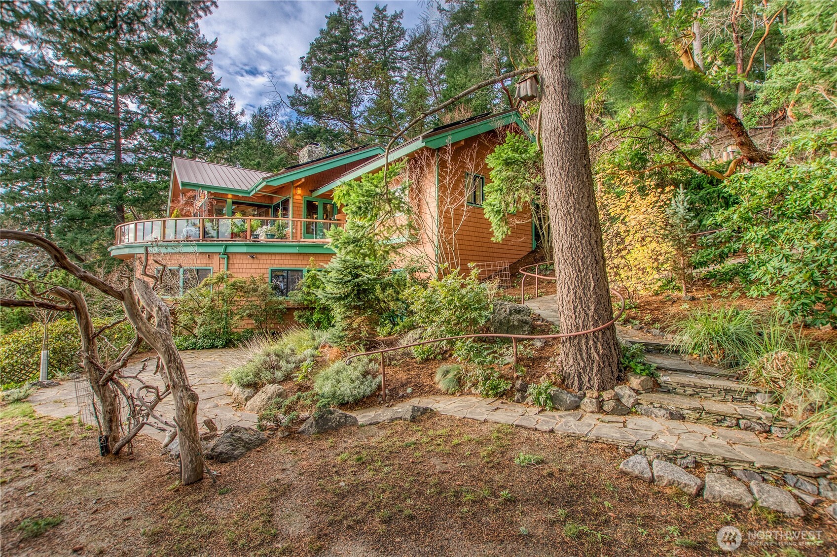 1689 Spring Point Road Orcas Island, WA 98245 - Photo 25 of 40 a front view of a house with a yard