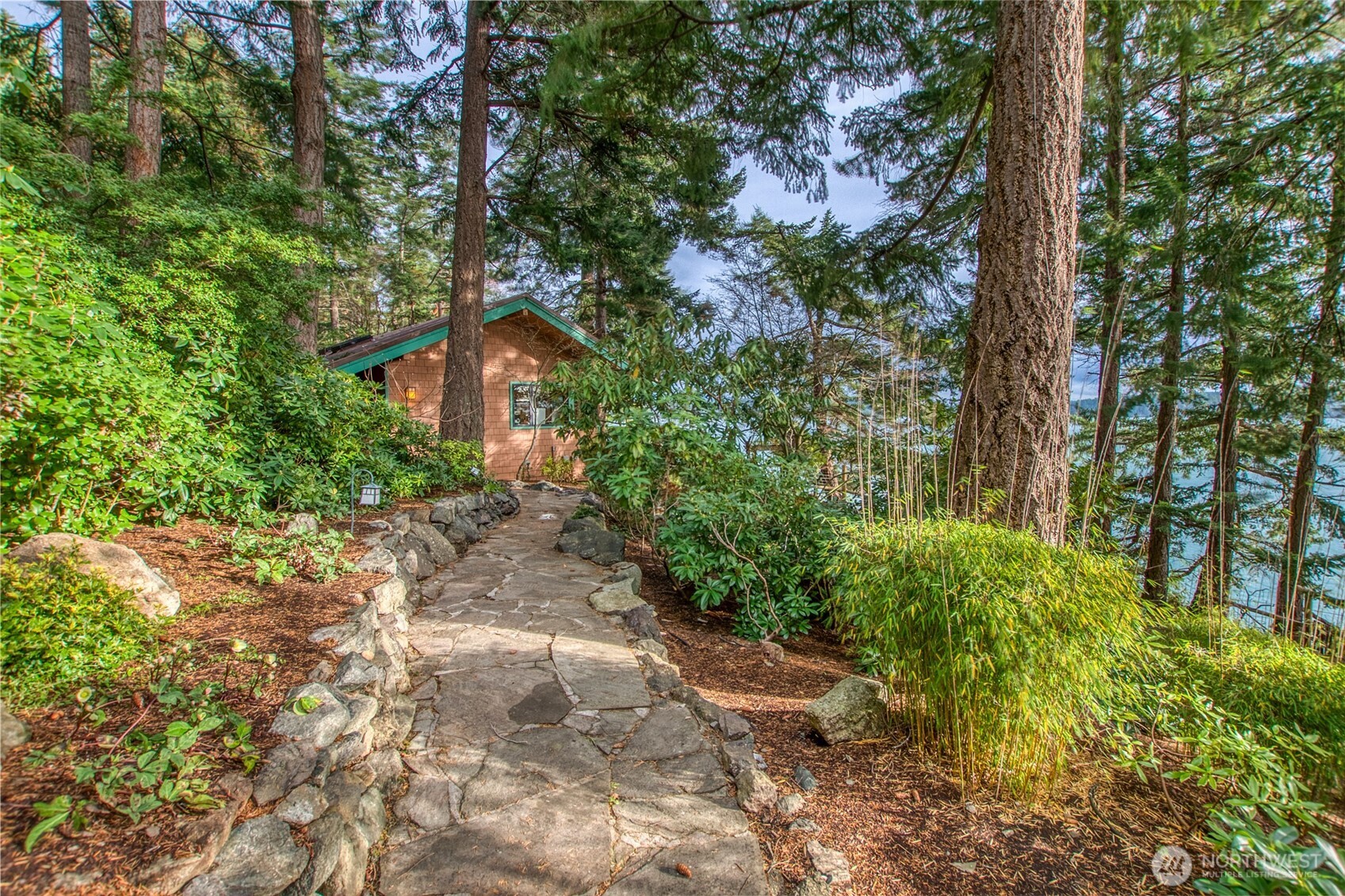 1689 Spring Point Road Orcas Island, WA 98245 - Photo 26 of 40 a front view of a house with a yard