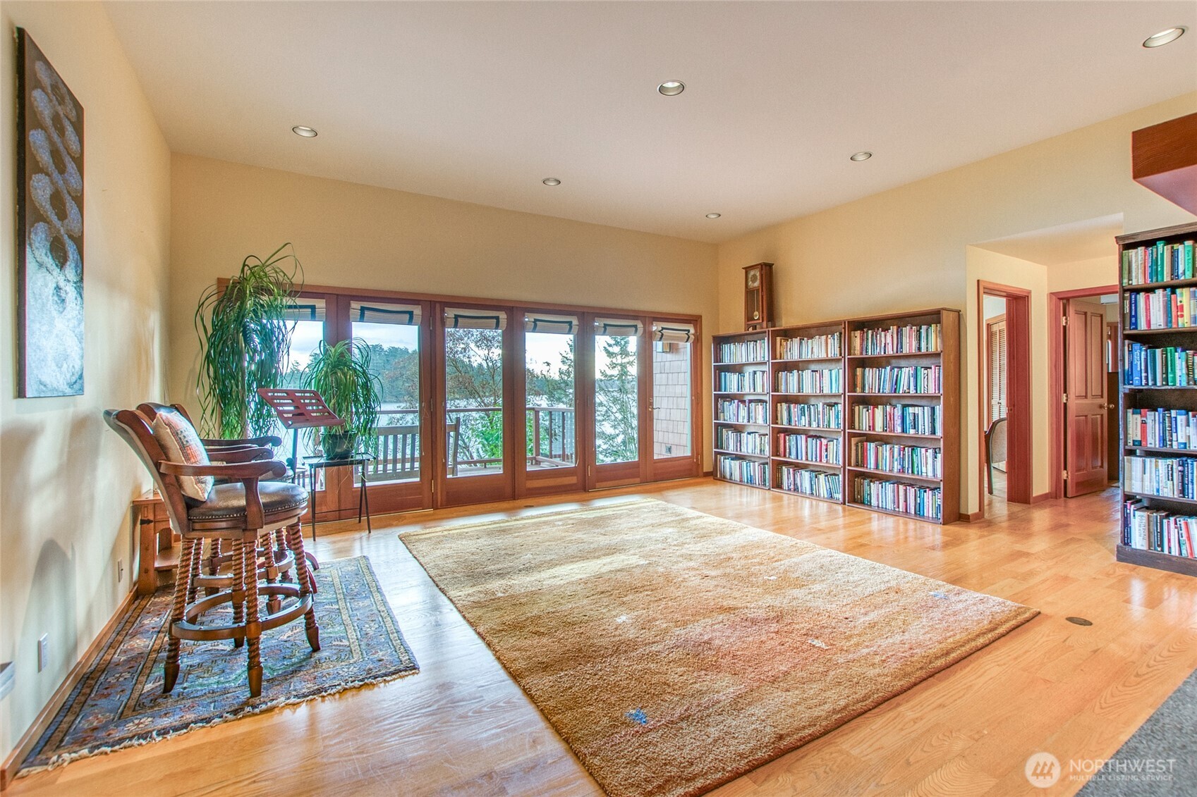 1689 Spring Point Road Orcas Island, WA 98245 - Photo 28 of 40 a living room with furniture a rug and a large window