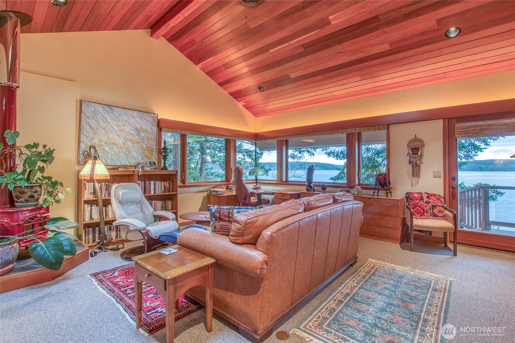 1689 Spring Point Road Orcas Island, WA 98245 - Photo 30 of 40 a living room with furniture and a large window