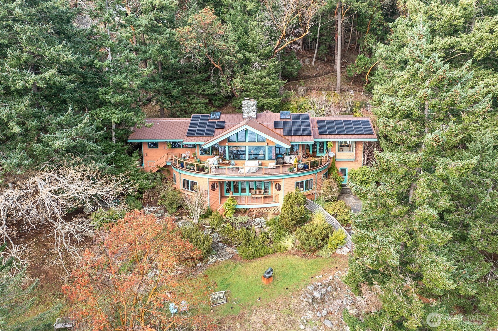 1689 Spring Point Road Orcas Island, WA 98245 - Photo 3 of 40 an aerial view of a house with a yard and large trees