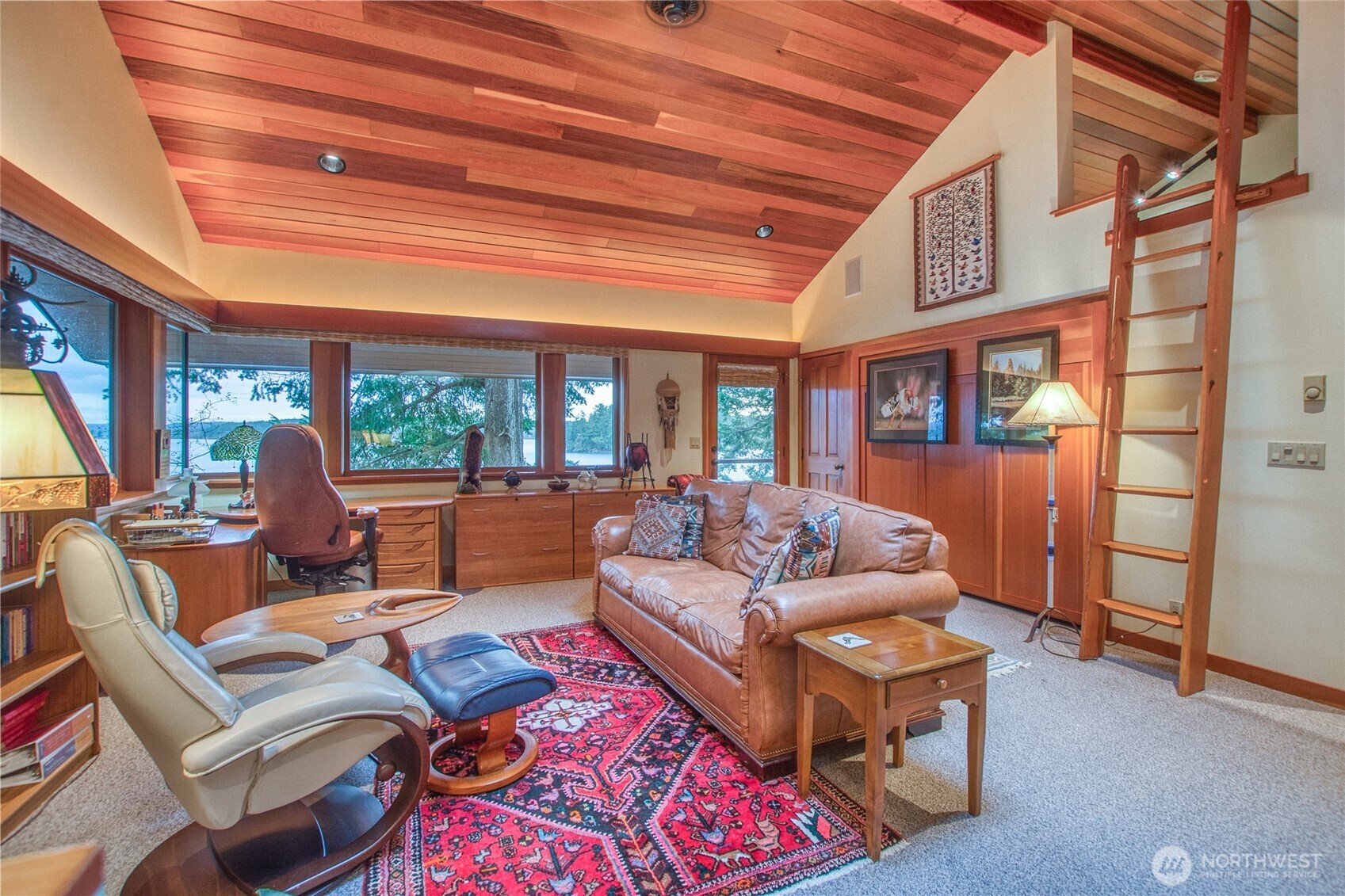 1689 Spring Point Road Orcas Island, WA 98245 - Photo 31 of 40 a living room with furniture and a large window