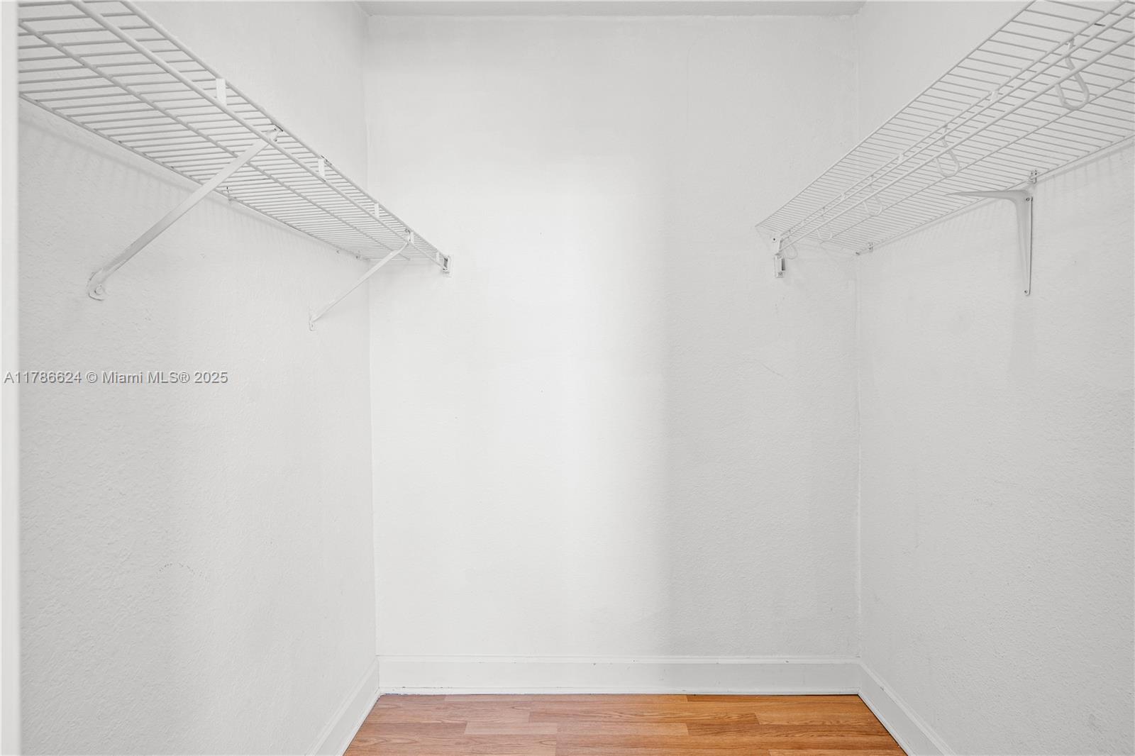 401 69th Street, Unit PH101 Miami Beach, FL 33141 - Photo 22 of 25 a view of small space with empty racks