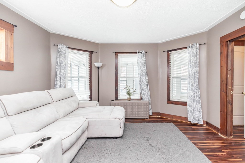77 Grover Street Springfield, MA 01104 - Photo 5 of 31 a living room with furniture and a window