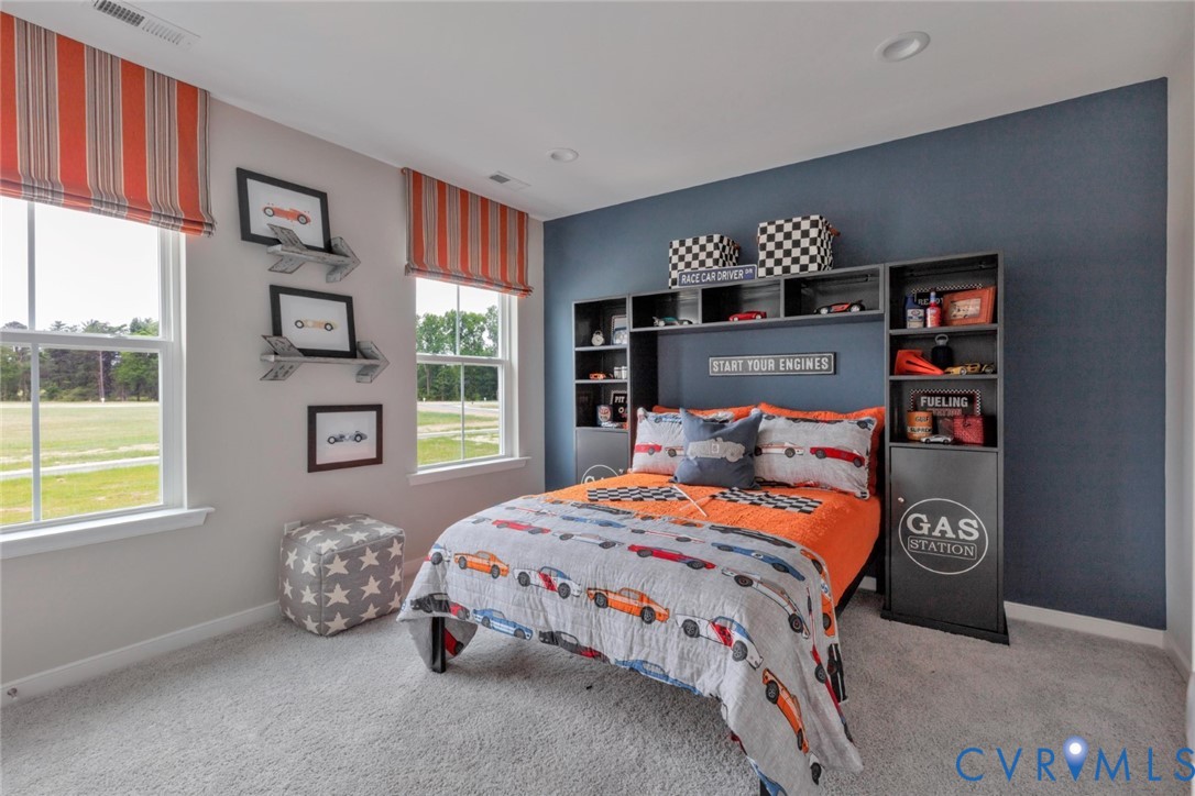 925 Charlemagne Road Midlothian, VA 23114 - Photo 26 of 43 a bedroom with a bed and a window