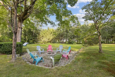 a view of a park with swings and slides