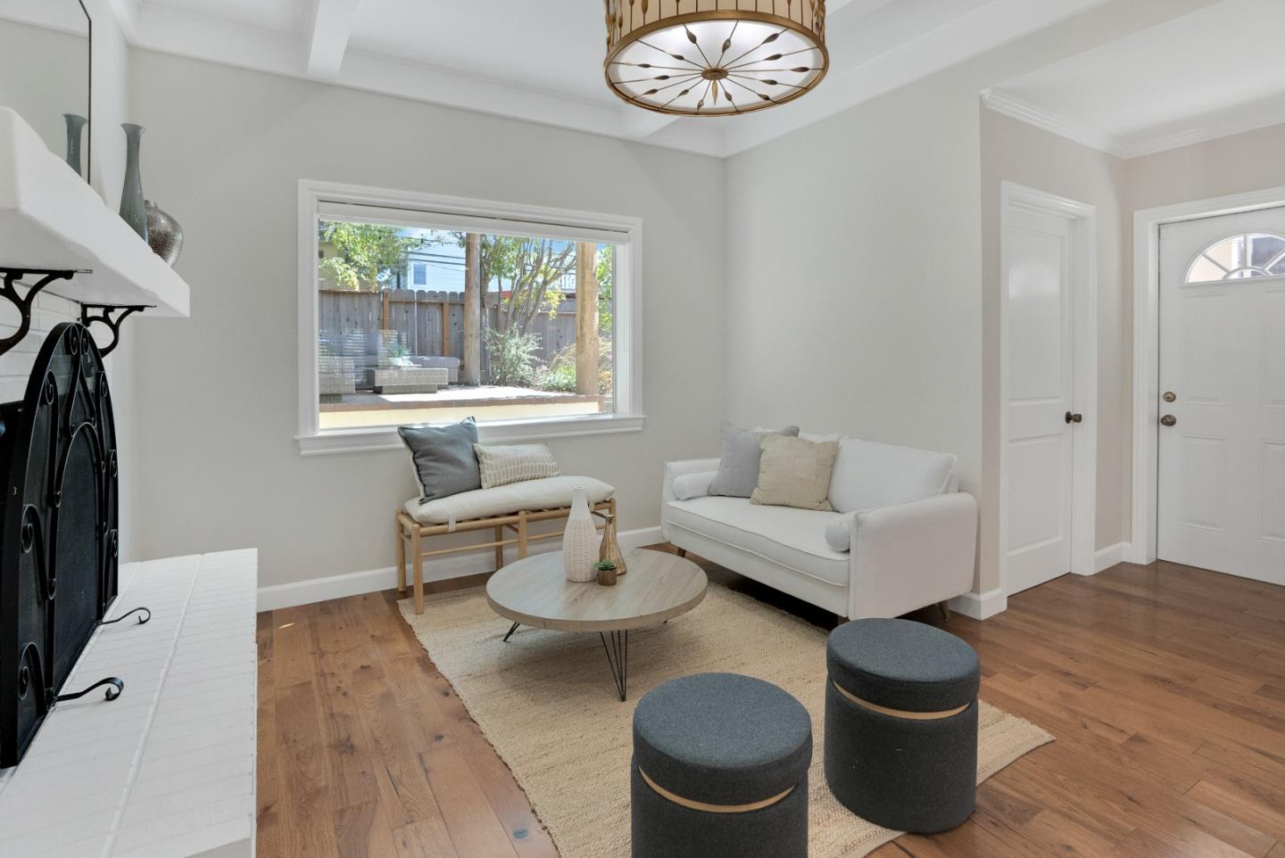 731 Hillcrest Boulevard Millbrae, CA 94030 - Photo 16 of 48 a living room with furniture a window and a table