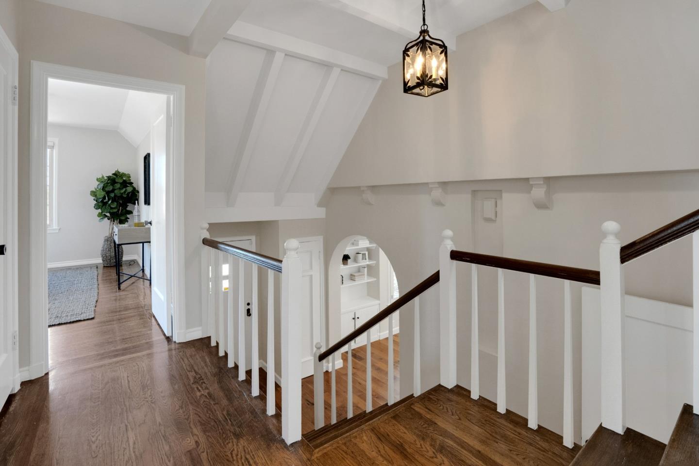 731 Hillcrest Boulevard Millbrae, CA 94030 - Photo 18 of 48 a view of a hallway with wooden floor and staircase