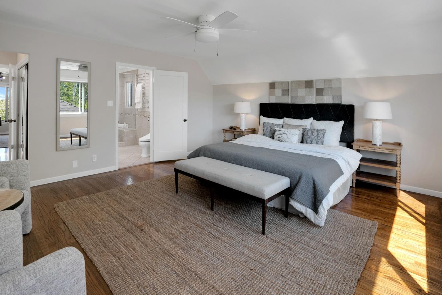 731 Hillcrest Boulevard Millbrae, CA 94030 - Photo 20 of 48 a spacious bedroom with a bed and wooden floor