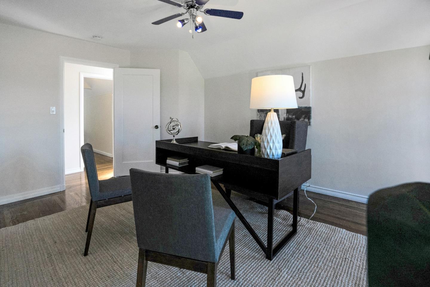 731 Hillcrest Boulevard Millbrae, CA 94030 - Photo 27 of 48 a dining room with furniture and a lamp