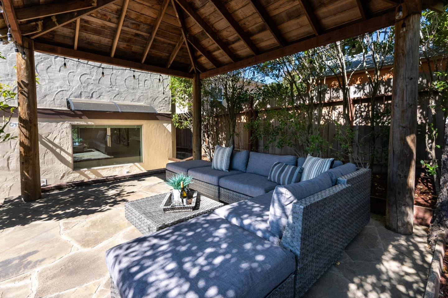 731 Hillcrest Boulevard Millbrae, CA 94030 - Photo 34 of 48 a living room with furniture and a fireplace
