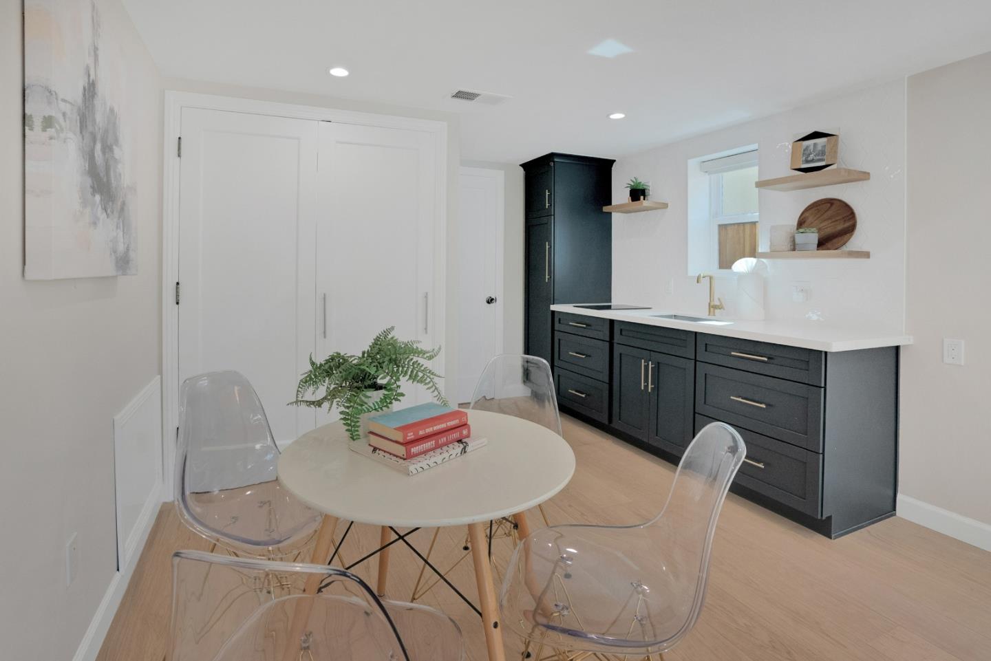 731 Hillcrest Boulevard Millbrae, CA 94030 - Photo 44 of 48 a kitchen with stainless steel appliances granite countertop a sink and a refrigerator