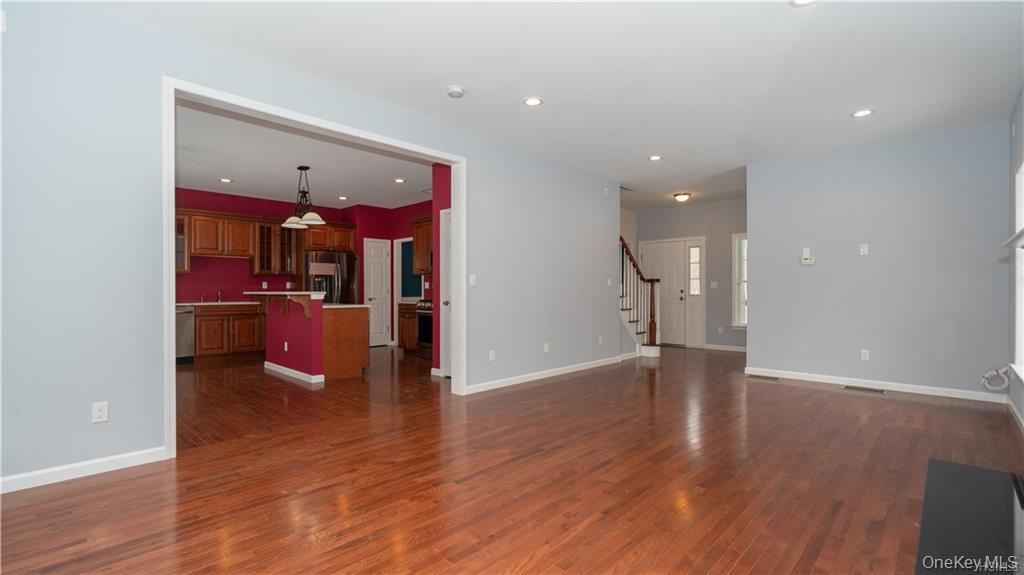 5 Harrier Ridge Drive Wallkill, NY 12589 - Photo 7 of 33 Unfurnished living room with stairs, recessed lighting, and dark wood finished floors