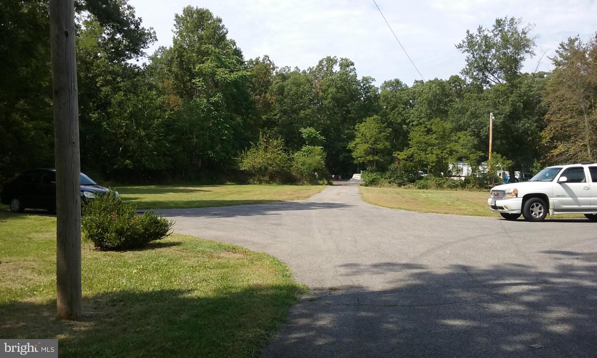 3650 Iowa Road Brandywine, MD 20613 - Photo 2 of 5 a view of a street with a car parked