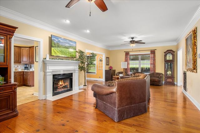 a view of a living room and bathroom