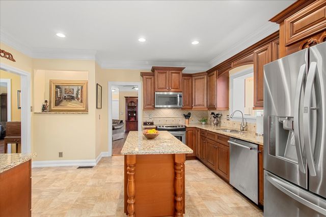 a bedroom with a bed and a fireplace