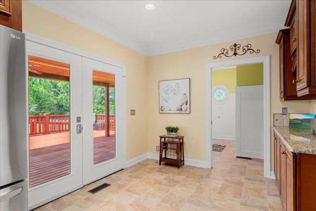 a view of a balcony with chairs