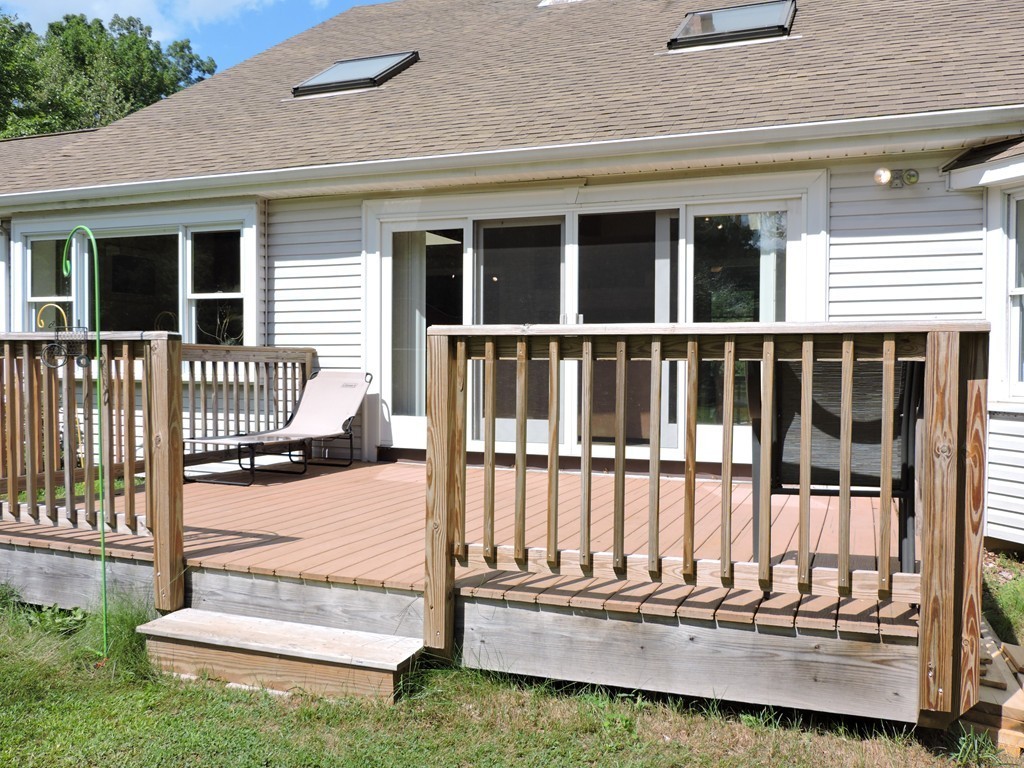 19 Mill Road North Brookfield, MA 01535 - Photo 4 of 30 a view of a house with backyard and deck