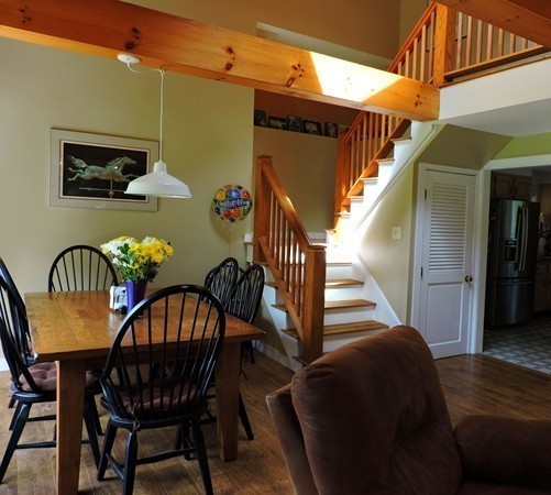 19 Mill Road North Brookfield, MA 01535 - Photo 8 of 30 a view of a dining room with furniture and wooden floor
