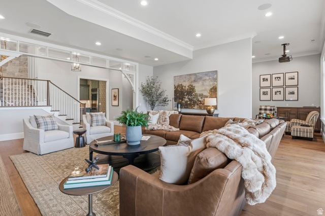 115 East Hidden Ridge Lane, Unit 42 Mapleton, UT 84664 - Photo 58 of 103 Expansive living area featuring wood-finish flooring, recessed lighting, and crown molding