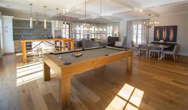 a room with lots of tables and chairs