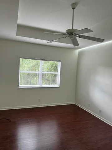 a view of a room that has a window in it