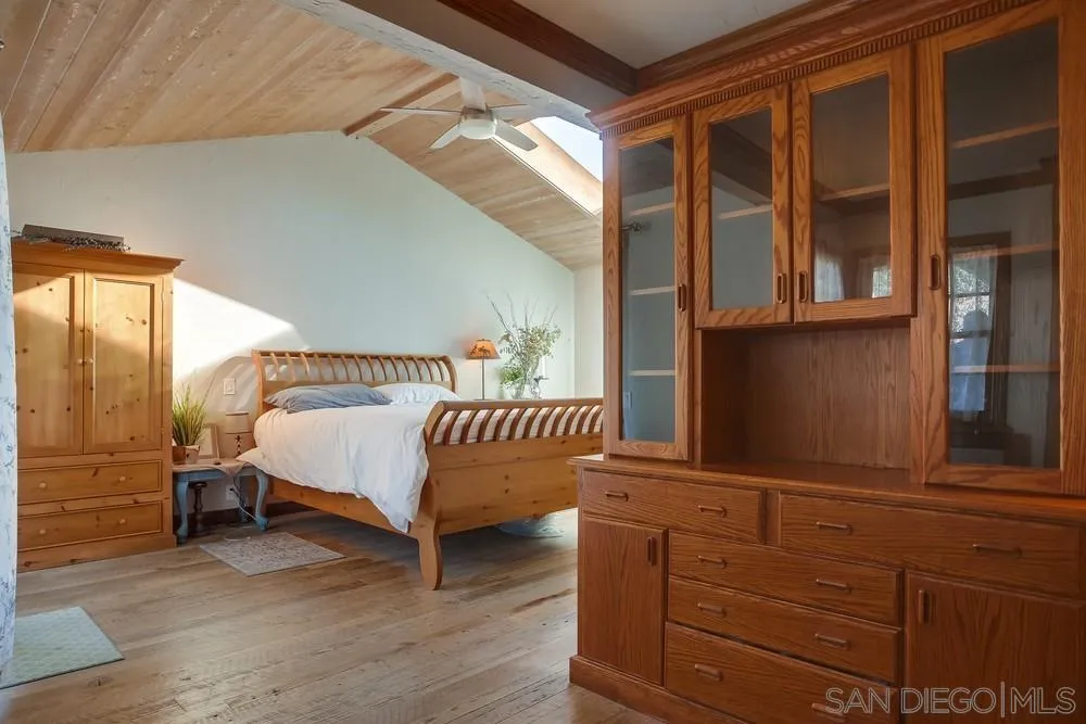 342 Cole Ranch Road Encinitas, CA 92024 - Photo 15 of 34 a bedroom with a bed and window