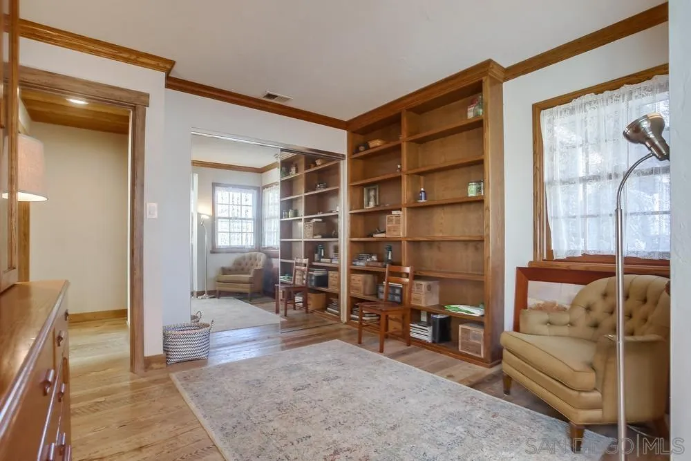 342 Cole Ranch Road Encinitas, CA 92024 - Photo 18 of 34 a living room with furniture a rug and white walls