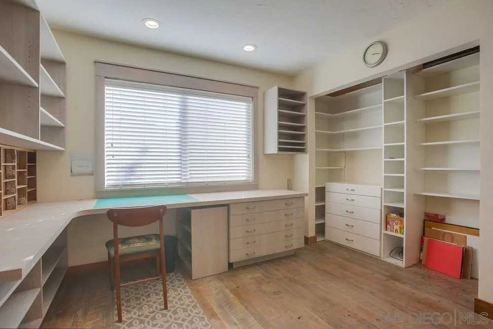 342 Cole Ranch Road Encinitas, CA 92024 - Photo 26 of 34 a view of a room with shelves and windows