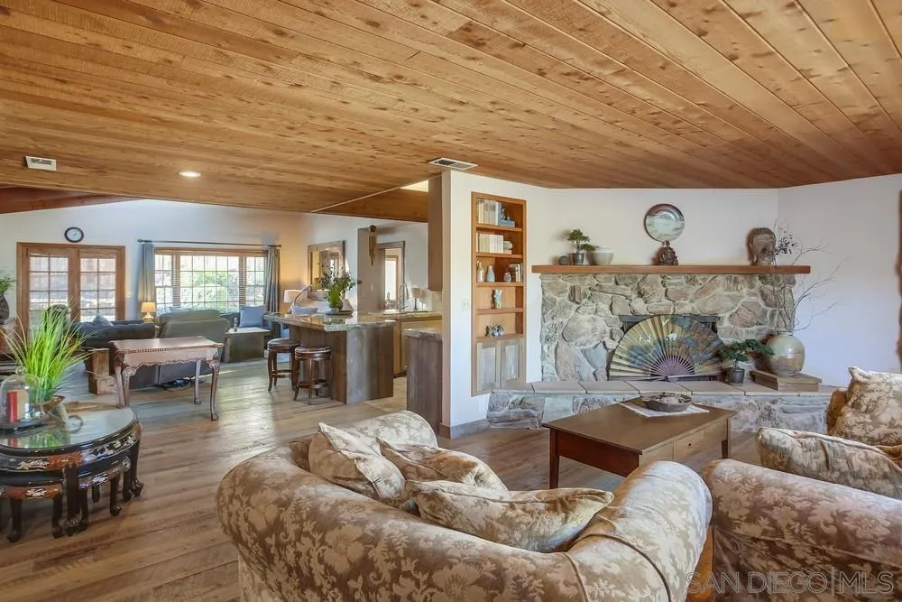 342 Cole Ranch Road Encinitas, CA 92024 - Photo 3 of 34 a living room with furniture and wooden floor