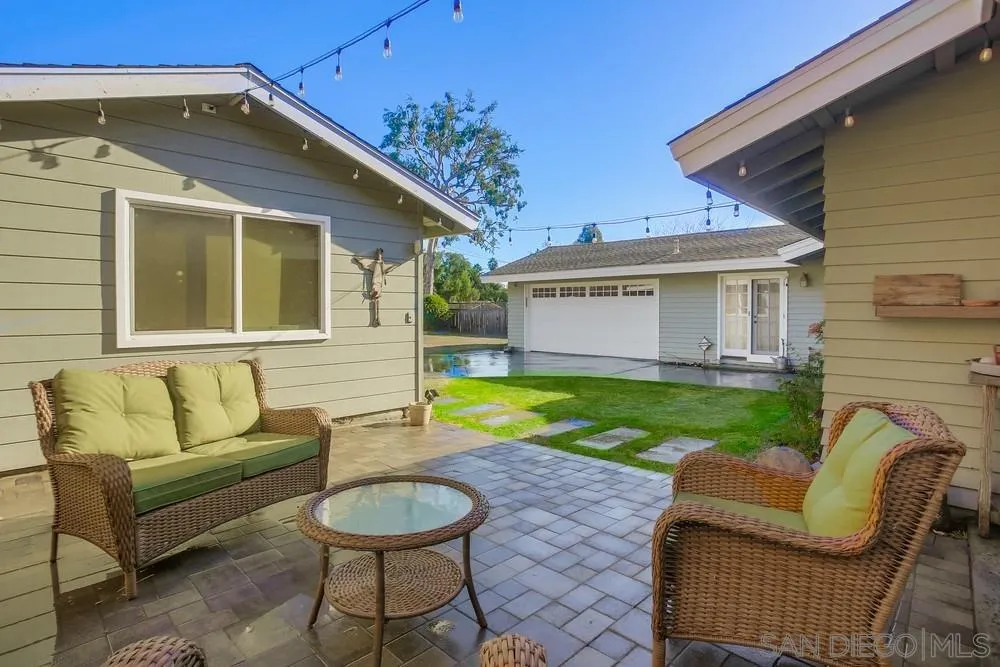 342 Cole Ranch Road Encinitas, CA 92024 - Photo 34 of 34 a view of a house with a backyard and a patio