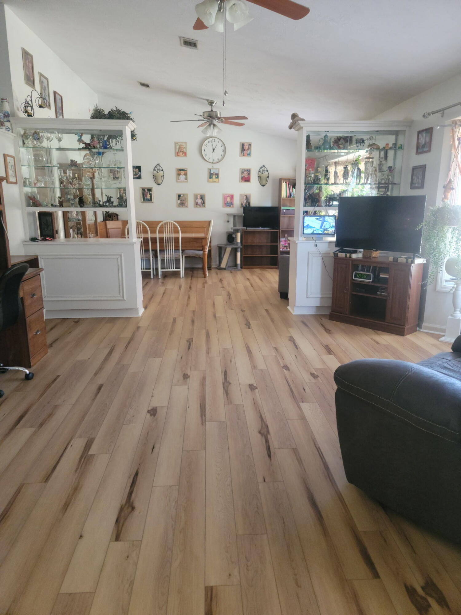 2765 Steiner Place Road Waynesboro, GA 30830 - Photo 26 of 68 Living room with divider showcases between living and dining rooms
