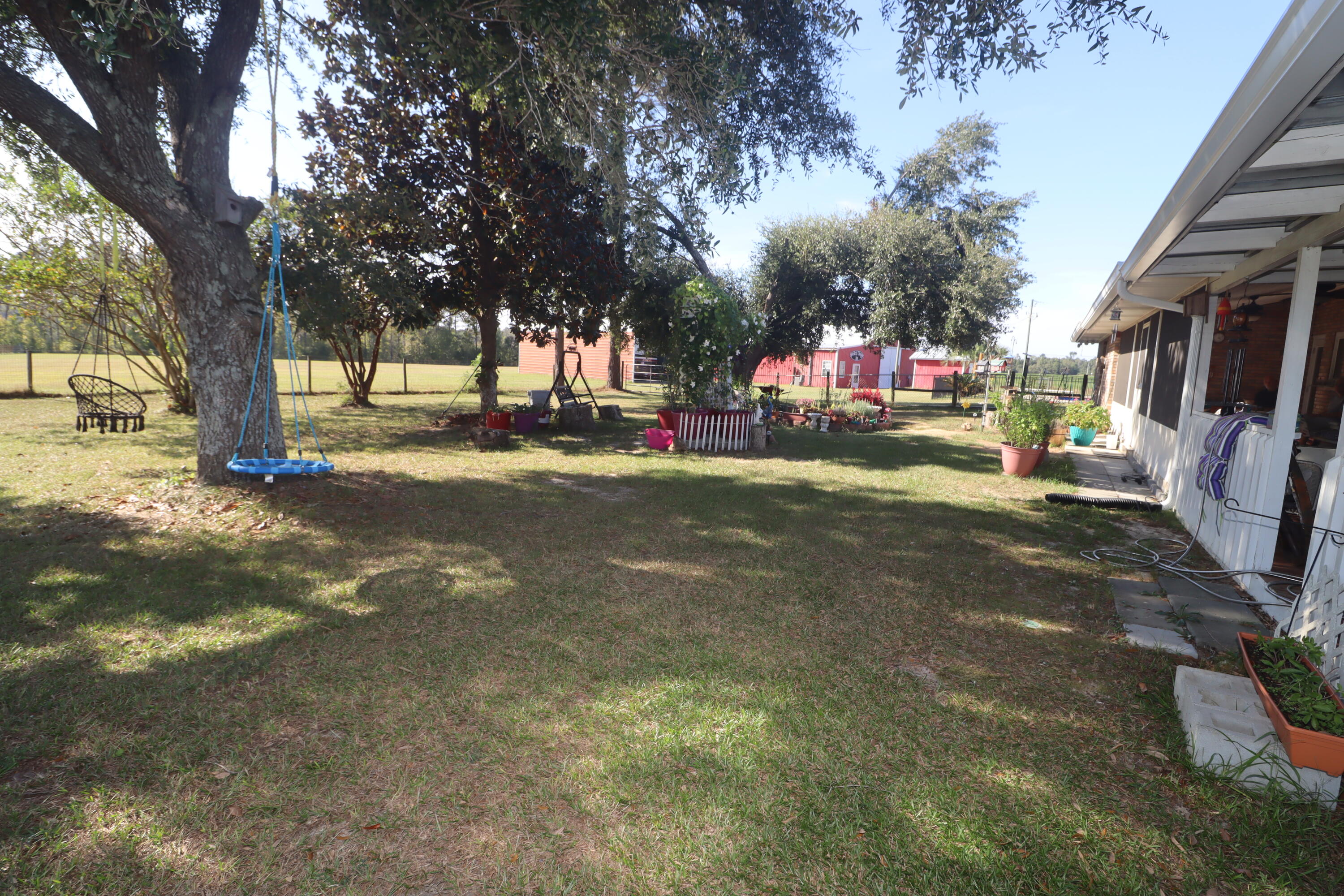 2765 Steiner Place Road Waynesboro, GA 30830 - Photo 3 of 68 Back yard has separate fencing for kids and pets