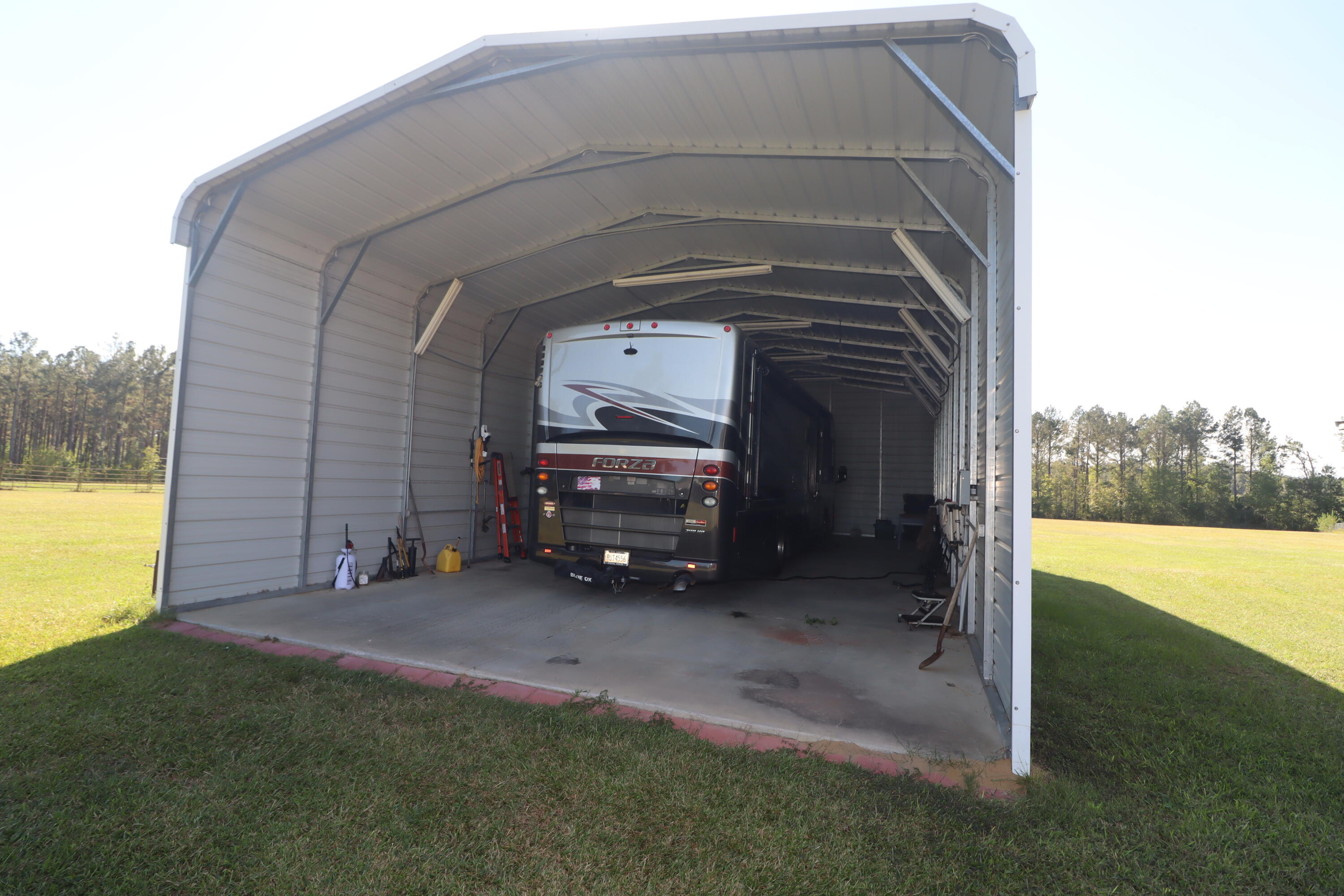 2765 Steiner Place Road Waynesboro, GA 30830 - Photo 40 of 68 RV shed 50 amp service and concrete floor... another hookup is in the front of the house, too