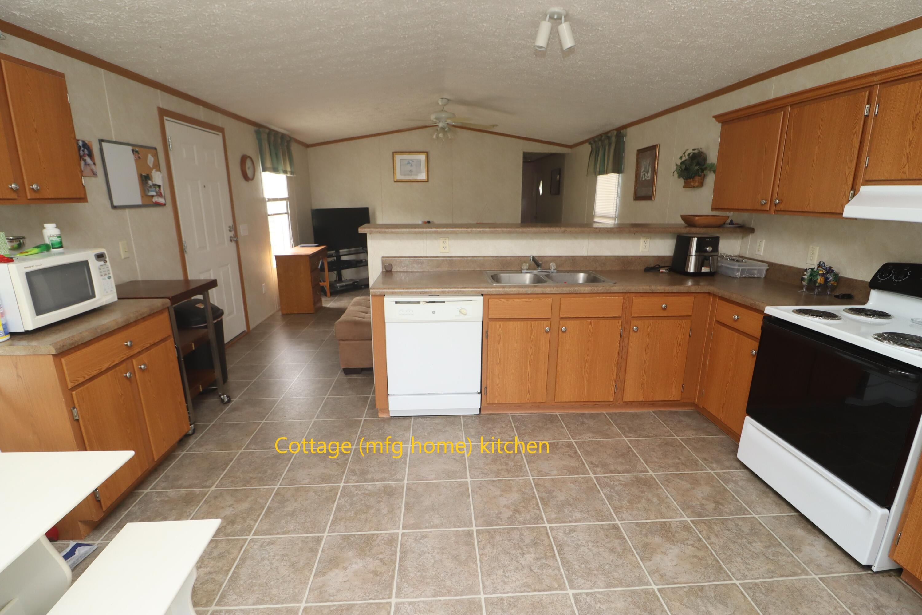 2765 Steiner Place Road Waynesboro, GA 30830 - Photo 60 of 68 Kitchen and den in guest cottage