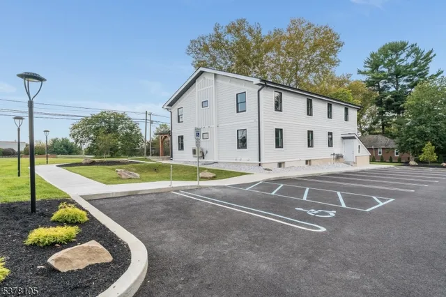 a view of a house with a street