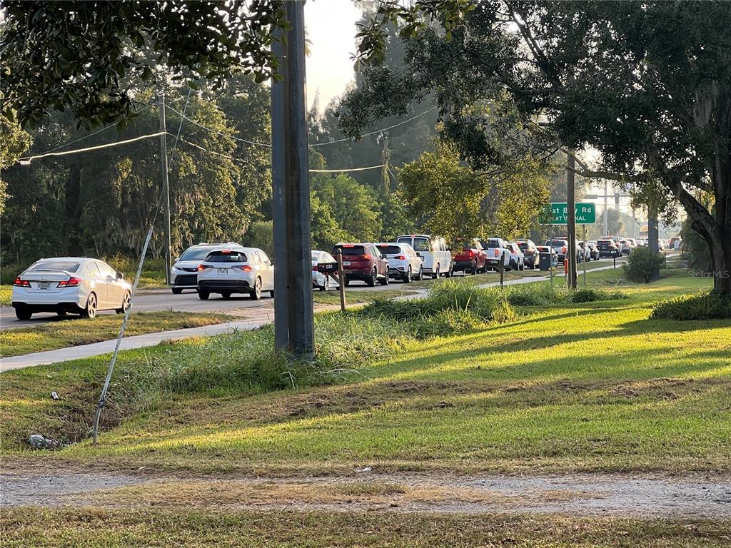 9013 Symmes Road Gibsonton, FL 33534 - Photo 9 of 9 a view of a house with swimming pool and sitting area