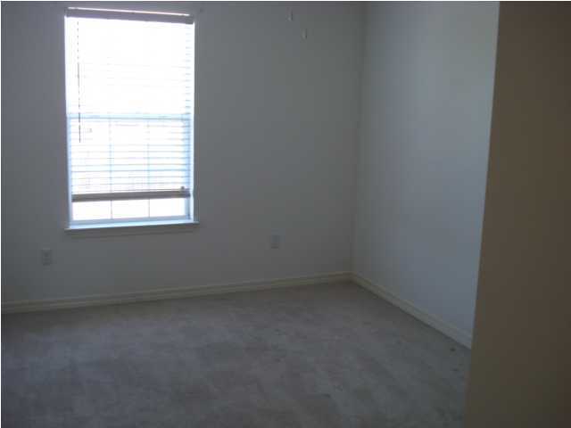 7 6th Shalimar, FL 32579 - Photo 14 of 23 an empty room with a window
