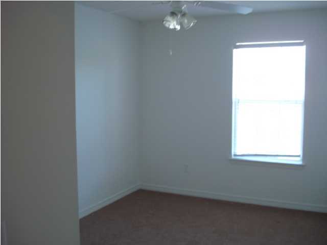 7 6th Shalimar, FL 32579 - Photo 16 of 23 an empty room with a window