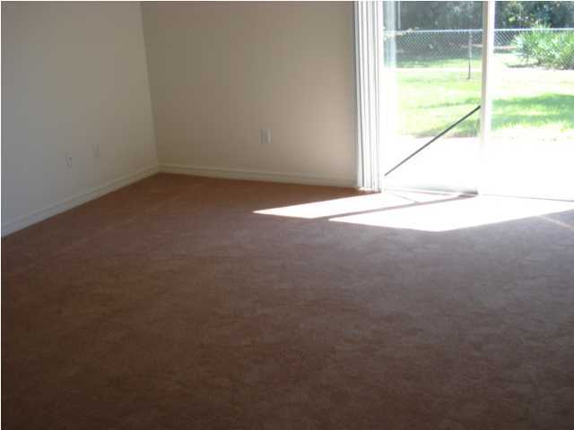 7 6th Shalimar, FL 32579 - Photo 20 of 23 an empty room with a window