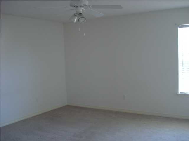 7 6th Shalimar, FL 32579 - Photo 8 of 23 an empty room with a window