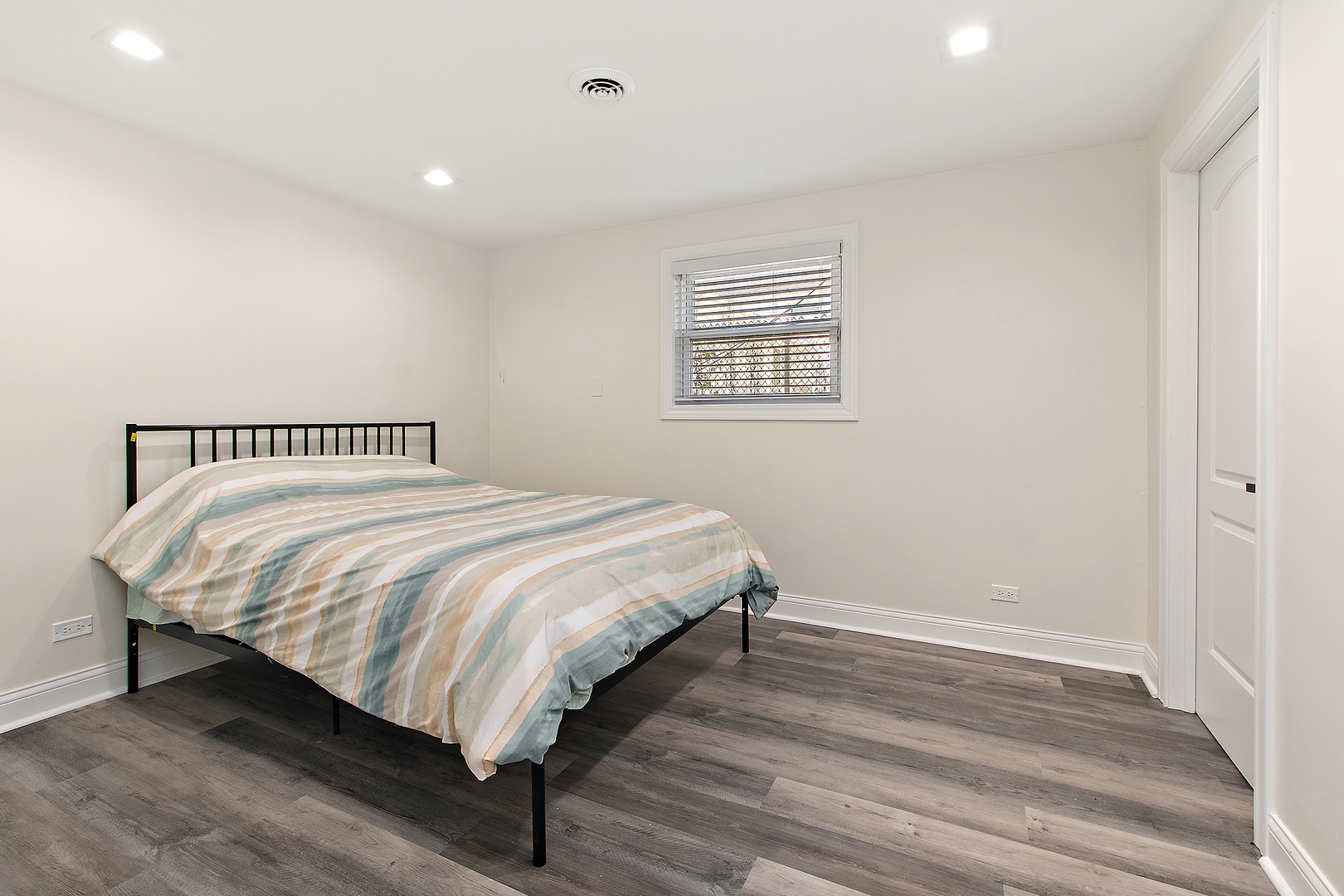 18849 Jamie Court Homewood, IL 60430 - Photo 29 of 35 a bedroom with a bed and wooden floor