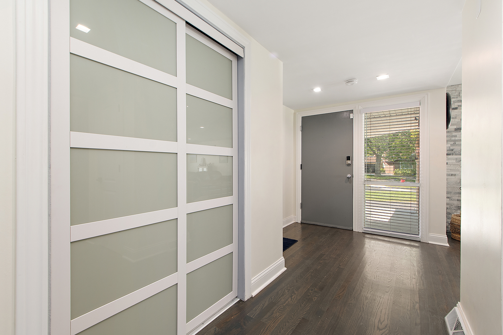 18849 Jamie Court Homewood, IL 60430 - Photo 5 of 35 a view of an empty room with wooden floor and a window