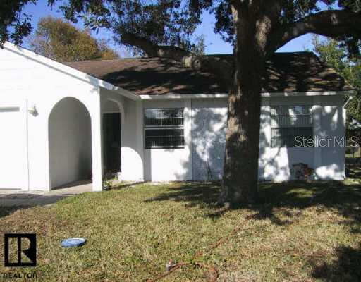7703 Mitchell Ranch Road New Port Richey, FL 34655 - Photo 1 of 1 Exterior Front