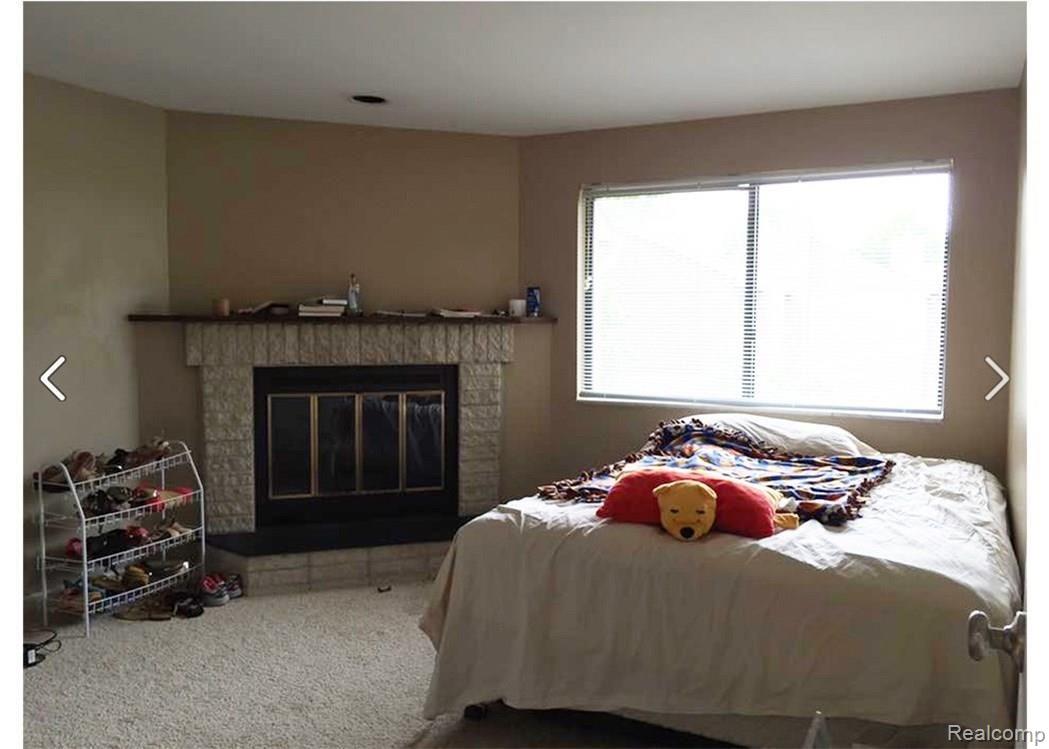 1804 Thomas Court, Unit 206 Rochester, MI 48309 - Photo 8 of 17 Fireplace Bedroom.jpg
